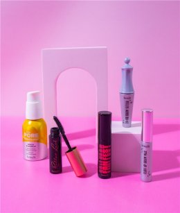 FREE Travel-Essentials Set when you buy two or more selected Benefit Products.*